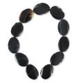Perle en pierre gemme Agate noire olive plate twistée 35x25 mm x1