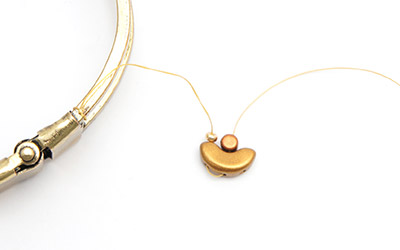 Bracelet en bronze Arcos® et Minos® Gold Iris Mat : Etape 1