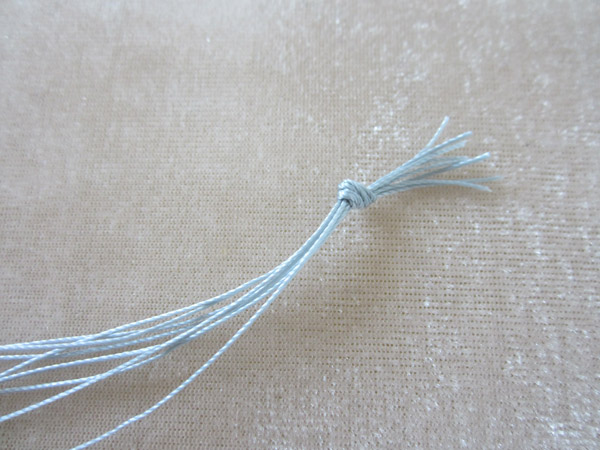 Bracelet manchette réversible en kumihimo avec des perles en verre Star Beads : Etape 1