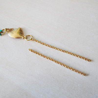 Bracelet coquillage chaîne épis et pompon : Etape 4