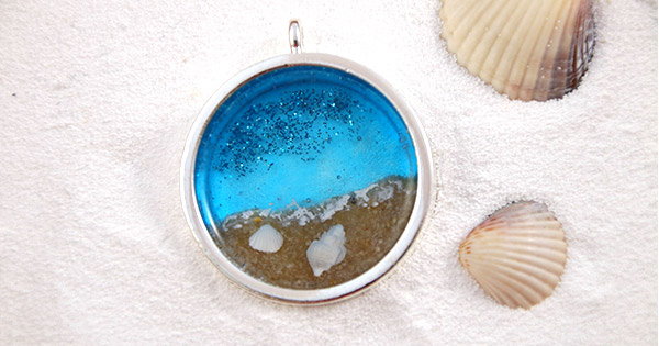 Schéma Pendentif en résine UV led paysage de bord de mer