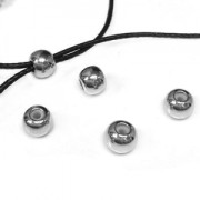 Perle stoppeur en métal 6 mm avec un trou de 1.2 mm Doré à l'or fin x1