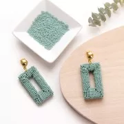 Clous d'oreilles demi-boule 10 mm bronze x2