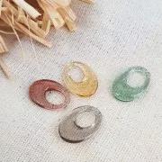 Pendentif ovale ajouré en acrylique 20x14 mm - Vert transparent x1