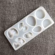 Moule silicone pour réaliser des cabochons plats et en relief en résine 17x8 cm x1