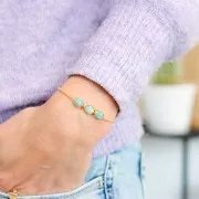 Perle ovale facettée 9x7 mm en imitation pierre gemme - Doré - Turquoise x1