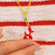 Breloque chien ballon 20x16 mm - résine époxy - Noir x1