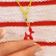 Breloque chien ballon 20x16 mm - résine époxy - Noir x1