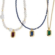 Pendentif rectangle 18x10 mm avec résine époxy - Doré à l'or fin - Noir nacré x1