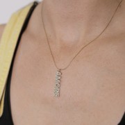 Pendentif Amore avec oxydes zirconium 35x7 mm - Acier inoxydable 316L Doré x1