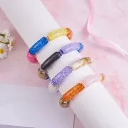 Coffret de 60 perles tube incurvé en acrylique transparent 35x11mm effet craquelé