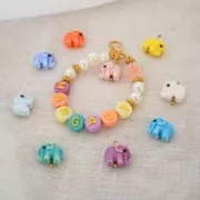 Perles rondelles fleurs 6 mm - Acier inoxydable 316L Doré x4