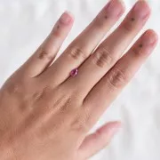 Saphir Padparadscha taille poire - 6.9x4.8 mm - 0.65 cts