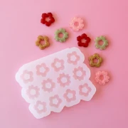 Moule en silicone Géa Creations pour réaliser des pendentifs mix de fleur 18 mm x1