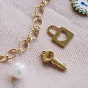 Mes bijoux DIY - Kit bijoux Collier charms Clés en Acier Inoxydable Doré