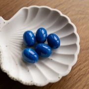 Perle olive 21x15 mm en résine opaque - Bleu royal marbré x1