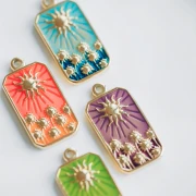 Pendentif rectangle motif Soleil 26x13 mm résine époxy Acier inox 304 Doré Violet