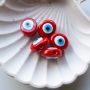 Perle ovale irrégulière 21x17 mm en verre - motif oeil - Rouge - Bleu ciel x1