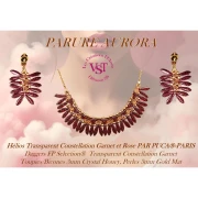 Perles en verre Hélios® par Puca® 6x10 mm - Transparent Constellation Garnet x10g