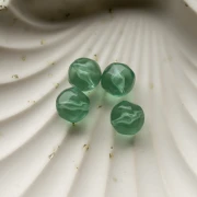 Perles rondes irrégulières facettées 12 mm résine transparente - Vert mousse x4