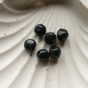Perles rondes irrégulières facettées 12 mm en résine opaque - Noir pailleté x4