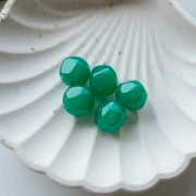 Perles rondes irrégulières facettées 14 mm résine transparente - Jade x1