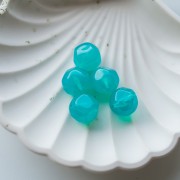 Perles rondes irrégulières facettées 14 mm résine translucide - Bleu caraïbe x1