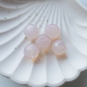 Perle ronde irrégulière facettée 14 mm en résine transparente - Rose pâle