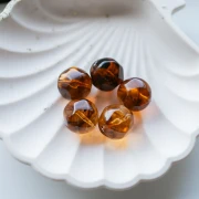 Perle ronde irrégulière facettée 16 mm en résine translucide - Topaz marbré x1