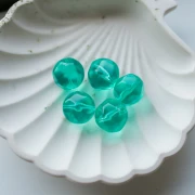Perle ronde irrégulière facettée 16 mm en résine transparente - Aqua x1