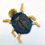 Miyuki Delica 11/0 DB2265 - Opaque Chartreuse Picasso x 8g