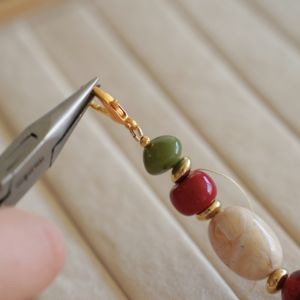 finition fil cabl&eacute; perle &agrave; &eacute;craser