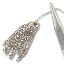 Comment utiliser une coquille pour faire un pompon avec des chaines ? : Etape 8