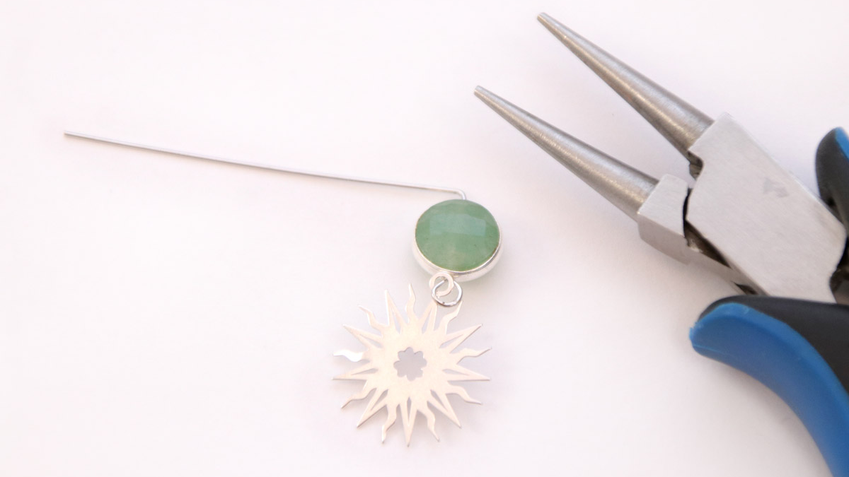 Créoles noires plaqué argent fin porte-bonheur : Etape 4