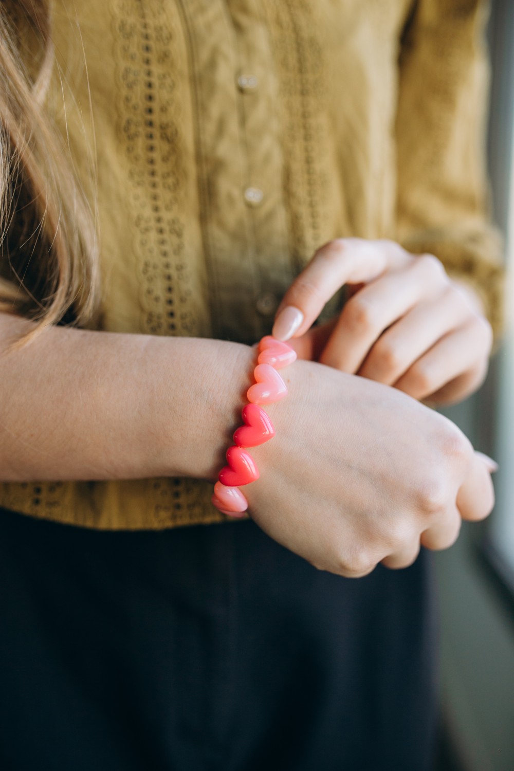 Collier perles cœur en résine
