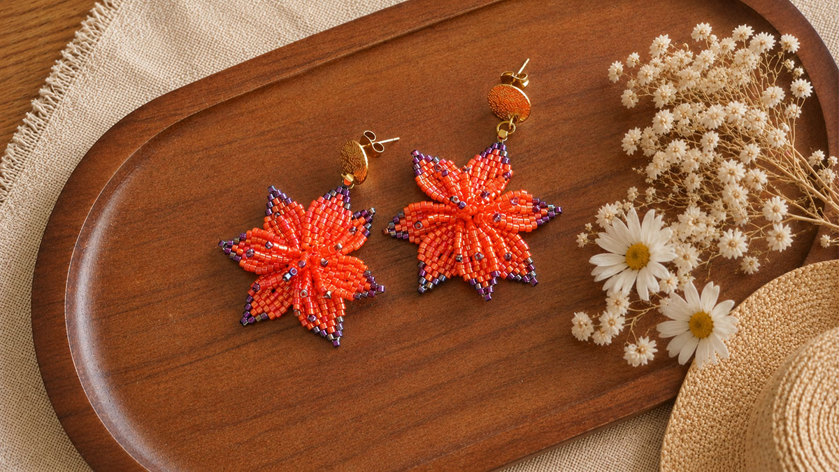 Boucles d'oreilles fleurs 7 pétales tissées